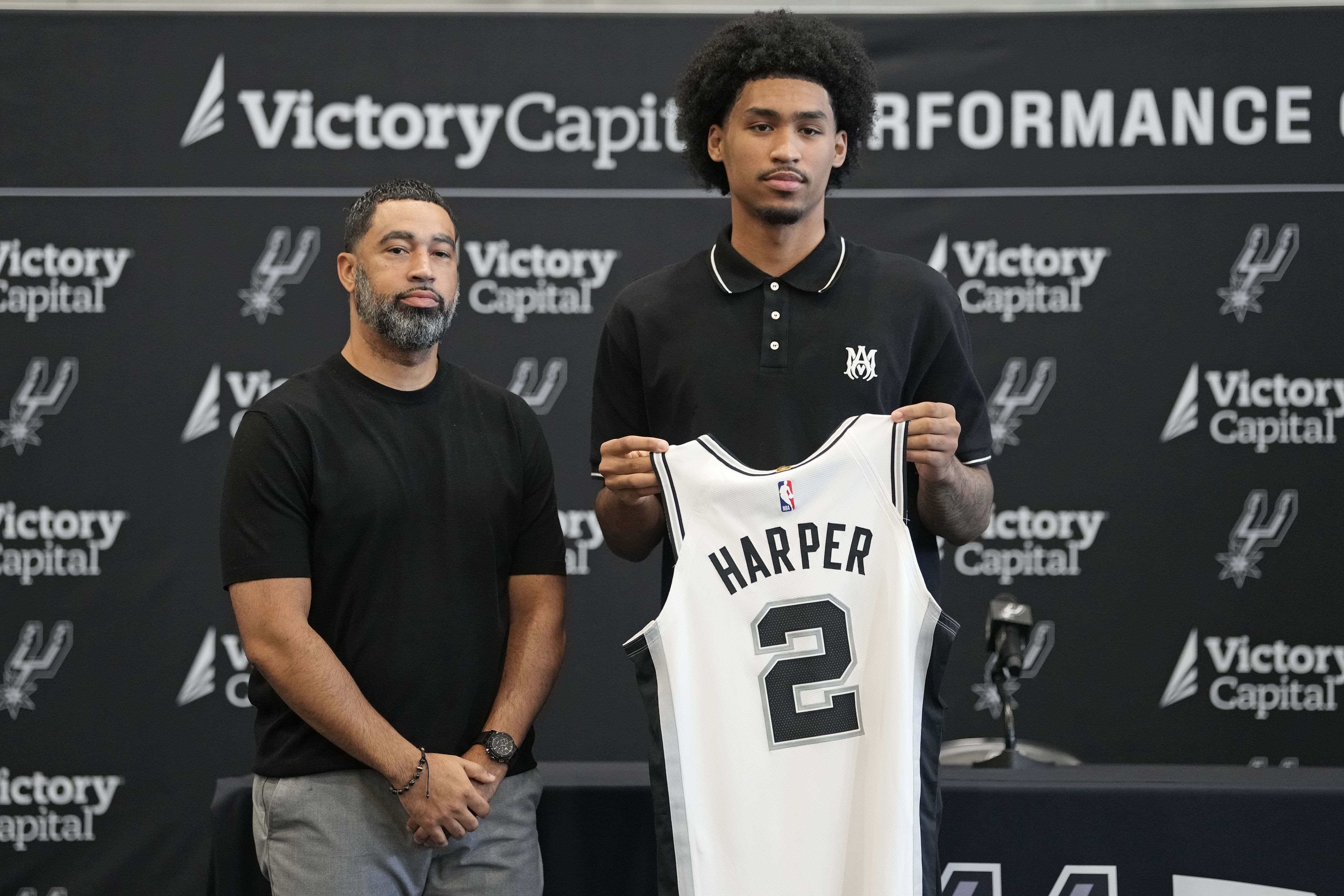 Ron Harper defends Dylan Harper for his jersey number choice. (Photo: IMAGN)